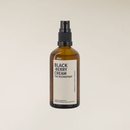 Blackberry cream scented room spray in an amber bottle 