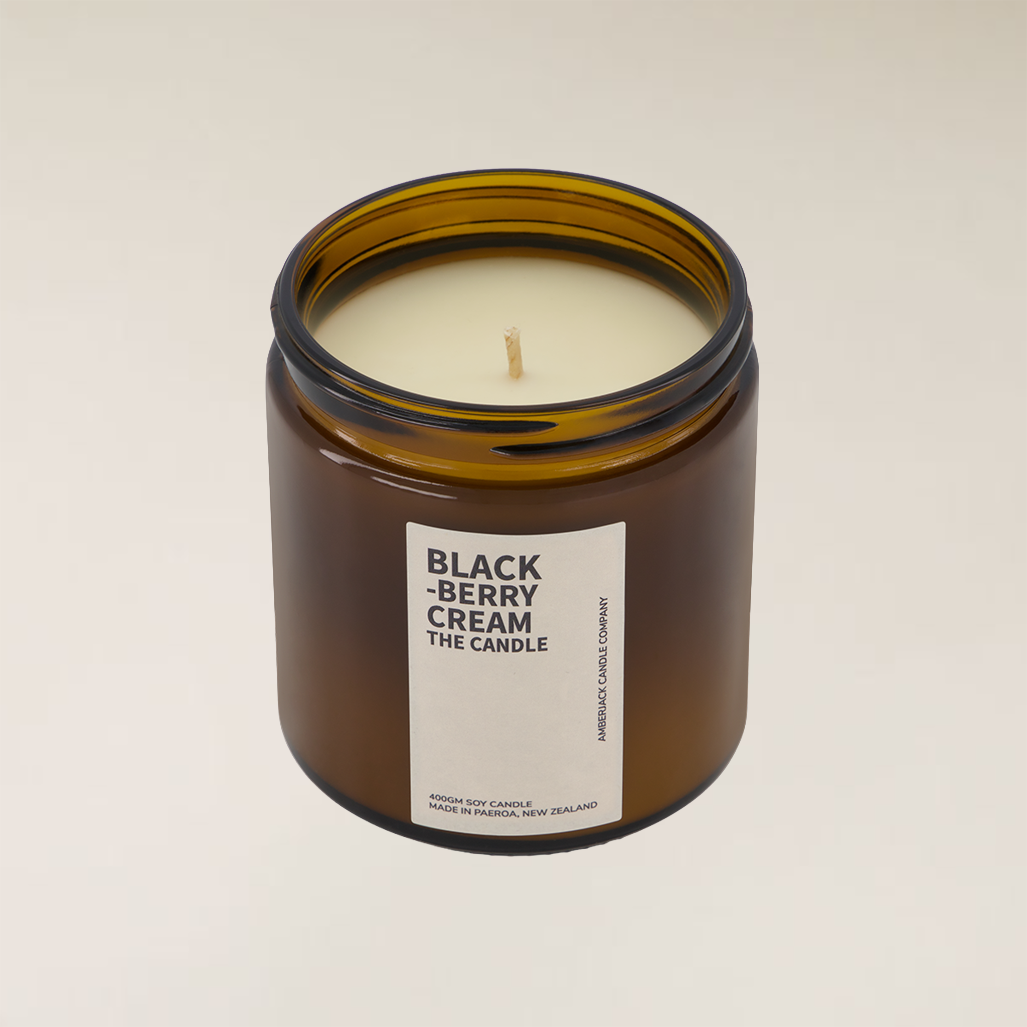 Large size Blackberry Cream scented soy candle in an amber jar
