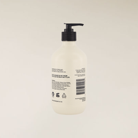 400ml Brown Sugar & Fig hand and body wash in a light beige recycled NZ milk bottle with a black pump.