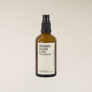 Brown Sugar & Fig 100ml amber glass room spray bottle with black pump and white label.
