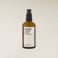 Brown Sugar & Fig 100ml amber glass room spray bottle with black pump and white label.