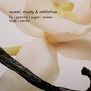 Close-up of a vanilla bean with flowers and text describing scents.