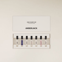 Amberjack Perfume Discovery Set with 7 clear 2.5ml sample vials in a white box.