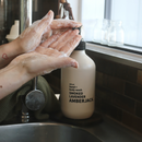 Hand and body wash being used to wash hands