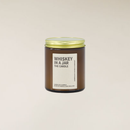 150gm Whiskey in a Jar soy candle in a brown glass jar with a gold lid and cream label.