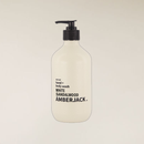 400ml White Sandalwood hand and body wash in a light beige recycled bottle with a black pump.