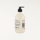 White sandalwood fragranced hand and body wash in a beige recycled bottle